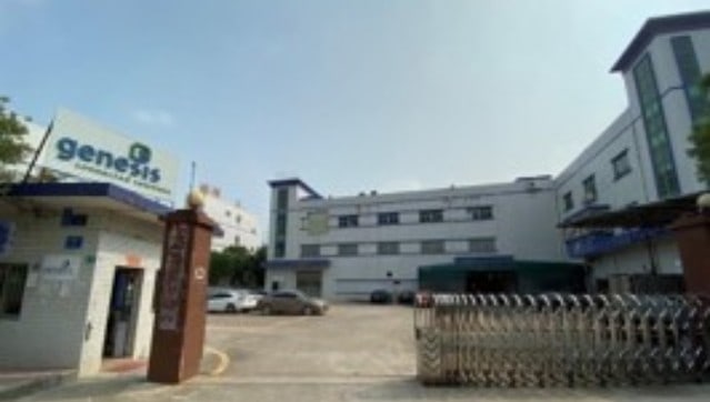 Genesis building, with shopping trolleys parked out the front