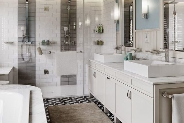 Open plan bathroom, including a bath and a shower, with sink, all white