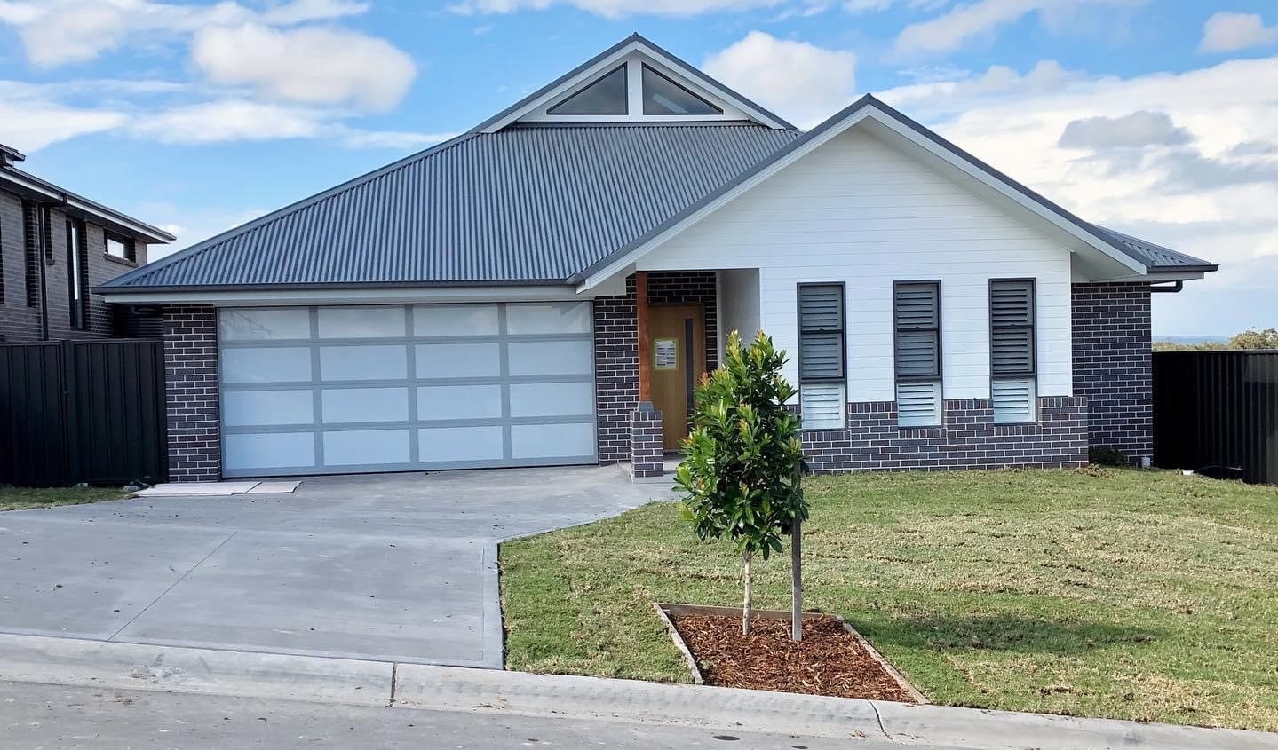 house with long driveway – newly built