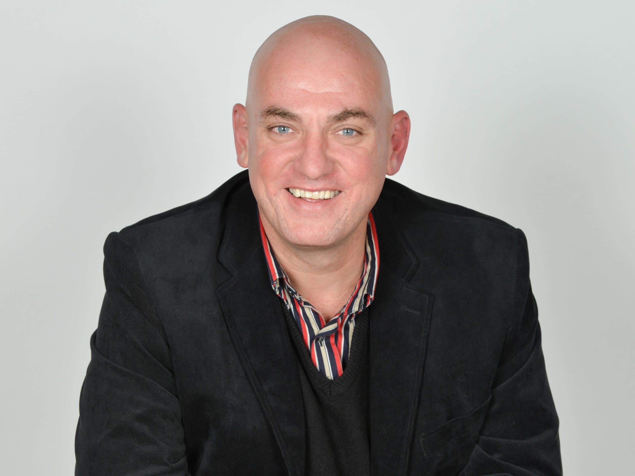 A portrait image of Matthew Comins, part-time CFO for North & West Yorkshire.